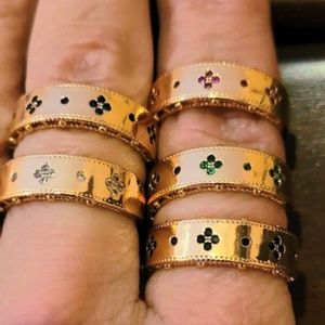 18 karat gold plated clover multicolor stone flush set stackable rings